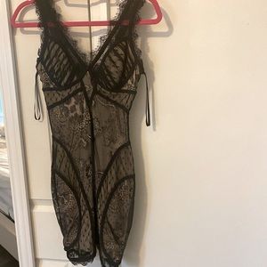 Bebe Black and nude lace mini dress